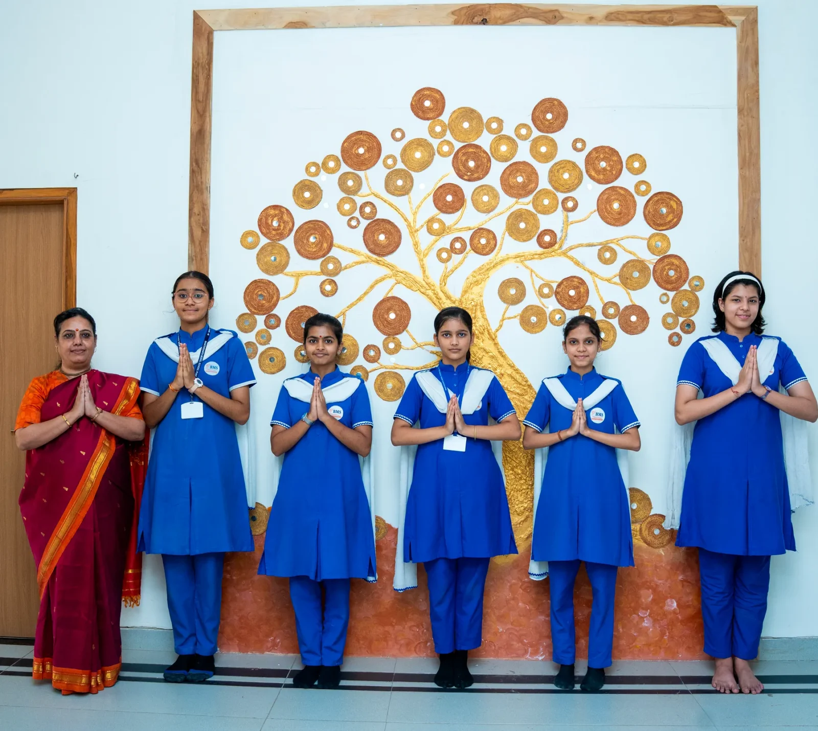 Students assembled on stage in the auditorium for a school event
